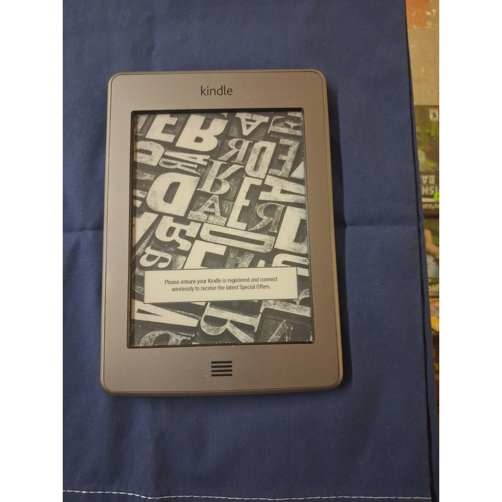 Amazon Kindle Touch 4th Gen. Works And Has A Cord That Will Charge It